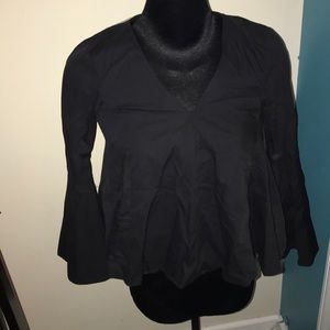 A long sleeve black blouse
